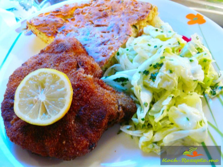 Mit Parmesan gebratene Schweinekoteletts