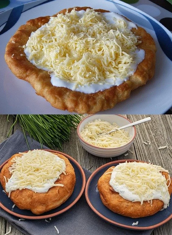 Ungarische Langos mit Knoblauch und frischen Zutaten auf einem Teller
