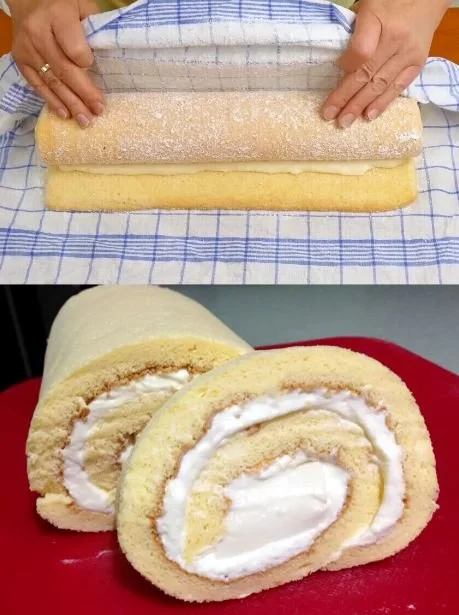 Biskuitrolle mit Sahne und Früchten als köstliches Dessert