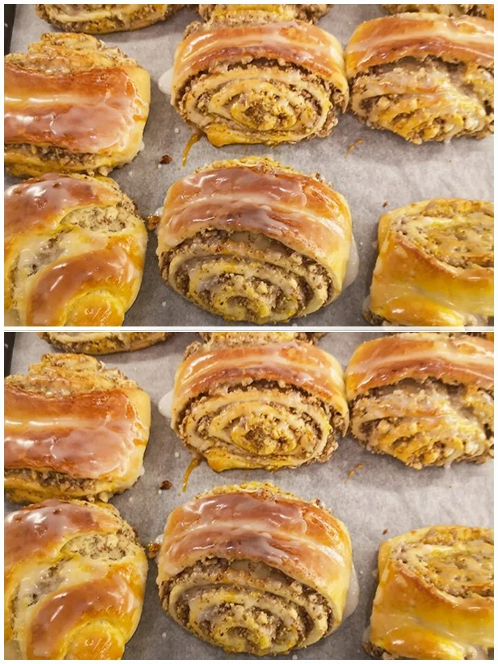 Lecker Nuss-Rollen auf einem Teller mit Schokolade und Nüssen dekoriert