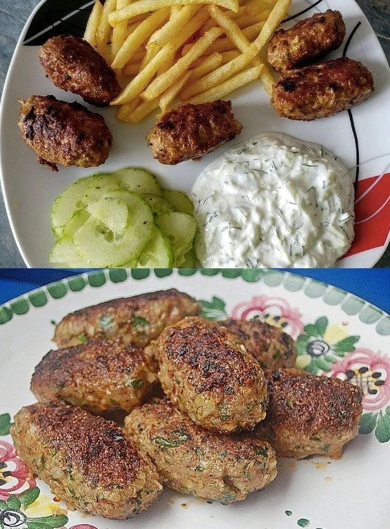 Türkische Hackröllchen serviert mit frischem Gemüse und Joghurtsoße