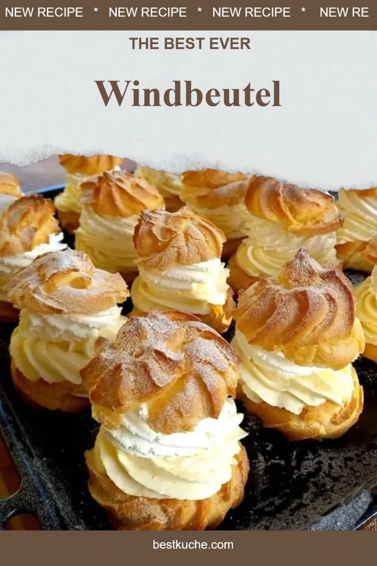 Leckere Windbeutel gefüllt mit Sahne und Früchten auf einem Teller