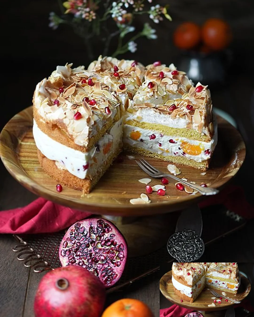 Himmelstorte mit Mandarinen und Granatapfel auf einem weißen Teller