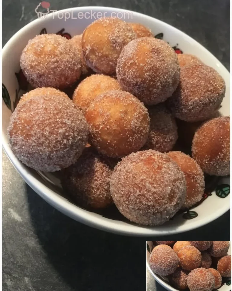 Leckere Quarkbällchen mit Zimt-Zucker auf einem Teller serviert